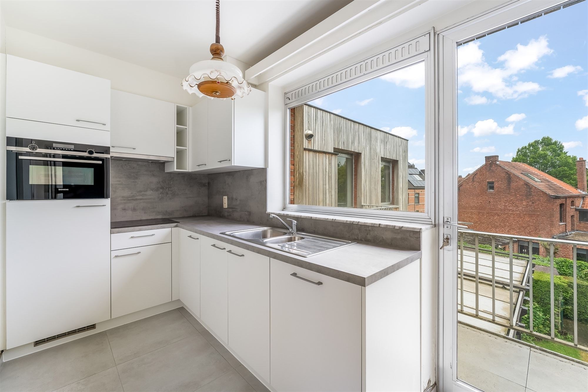 INSTAPKLAAR APPARTEMENT MET 2 SLPKS EN LIFT IN CENTRUM BALEN - foto 4