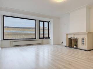 Looking for a spacious and bright apartment (with lift) on the coast? This beautifully renovated apartment with 2 large bedrooms and side sea view offers everything for those who want to live comfortably and stylishly.The cozy living space is spacious and combines contemporary comfort with characterful elements: authentic ornaments and an elegant fireplace have been tastefully preserved. In addition, the apartment has a practical separate kitchen.There are also 2 spacious bedrooms and a modern bathroom with a walk-in shower, completely renewed and ready to move in.What is unique is that there is only one apartment per floor, which provides extra peace and privacy. In addition, you can enjoy a beautiful side sea view from the apartment.Advantages of this apartment:-Large and bright with side sea view-Spacious living space with authentic decorative and fireplace elements-Separate kitchen- 2 large bedrooms- Modern bathroom with walk-in shower- Quiet living: 1 apartment per floor- Central location close to the sea and amenitiesAn ideal apartment for those who want to combine style, space and comfort with the charm of the Belgian coast.Are you interested in this property for rent in Ostend? Go to the website www.dewaele.com, click on the property you want to rent. Via the red button “request your visit”, we ask you to fill out a profile briefly. After that, we will contact you for a visit. Appointments cannot be made by phone. Request a visit