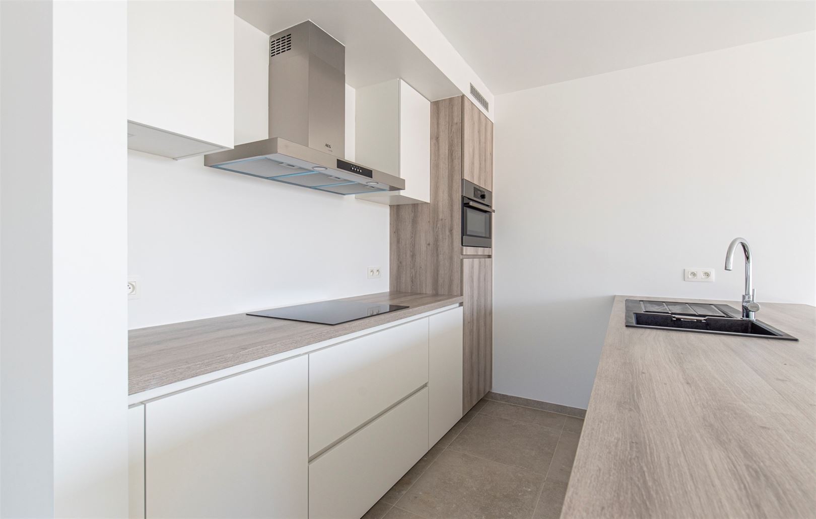 Prachtig gelijkvloers appartement met tuintje - foto 4