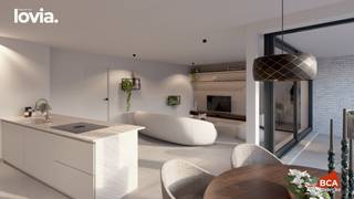<strong>Appartement 1.1 | LOVIA, hartje Aalter | 6% btw mogelijk! <br /><br />Info &amp; Verkoop: Sara - BCA | 0472 860 205 | sara@bcabouwtbeter.be </strong><br /><br />Ontdek appartement 1.1 in het stijlvolle nieuwbouwproject LOVIA, op slechts 50 meter van de Markt in Aalter.<br /><br />Met een bruto bewoonbare oppervlakte van 113,64 m² en een zuidgericht terras van 9,8 m², biedt dit appartement alles voor wie op zoek is naar ruimte, licht en hedendaags wooncomfort.<br /><br /><u>Indeling:</u><br />+ Ruime lichtrijke leefruimte met aansluitend terras (uitgevend in de Biesemkerkweg)<br />+ Volwaardige keukenruimte met open indeling<br />+ 2 slaapkamers<br />+ 2 badkamers<br />+ Ruime berging<br />+ Zuidgericht terras van 9,8 m²<br /><br />Dankzij de warmtepomp en zonnepanelen is dit appartement energiezuinig en toekomstgericht.<br />De afwerking is volledig personaliseerbaar volgens de smaak en wensen van de koper – van vloer tot keuken en badkamer.<br />Er is tevens mogelijkheid tot aankoop van een autostaanplaats in een afgesloten garage.<br /><br />💡 6% btw mogelijk - ook voor investeerders<br />✨ LOVIA – wonen met rust, comfort en klasse in het hart van Aalter.<br />🏗️ Koop rechtstreeks van aannemer BCA uit Aalter <br />📞 Contacteer BCA vandaag voor meer informatie, plannen of een vrijblijvend gesprek over uw nieuwe thuis bij LOVIA.<br />📞 Sara Van Belle | 0472 860 205  | sara@bcabouwtbeter.be