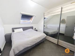 Instapklaar 2-slaapkamerappartement met terras vlakbij de Grote Markt.Dit perfect onderhouden appartement op de tweede verdieping van een recent...