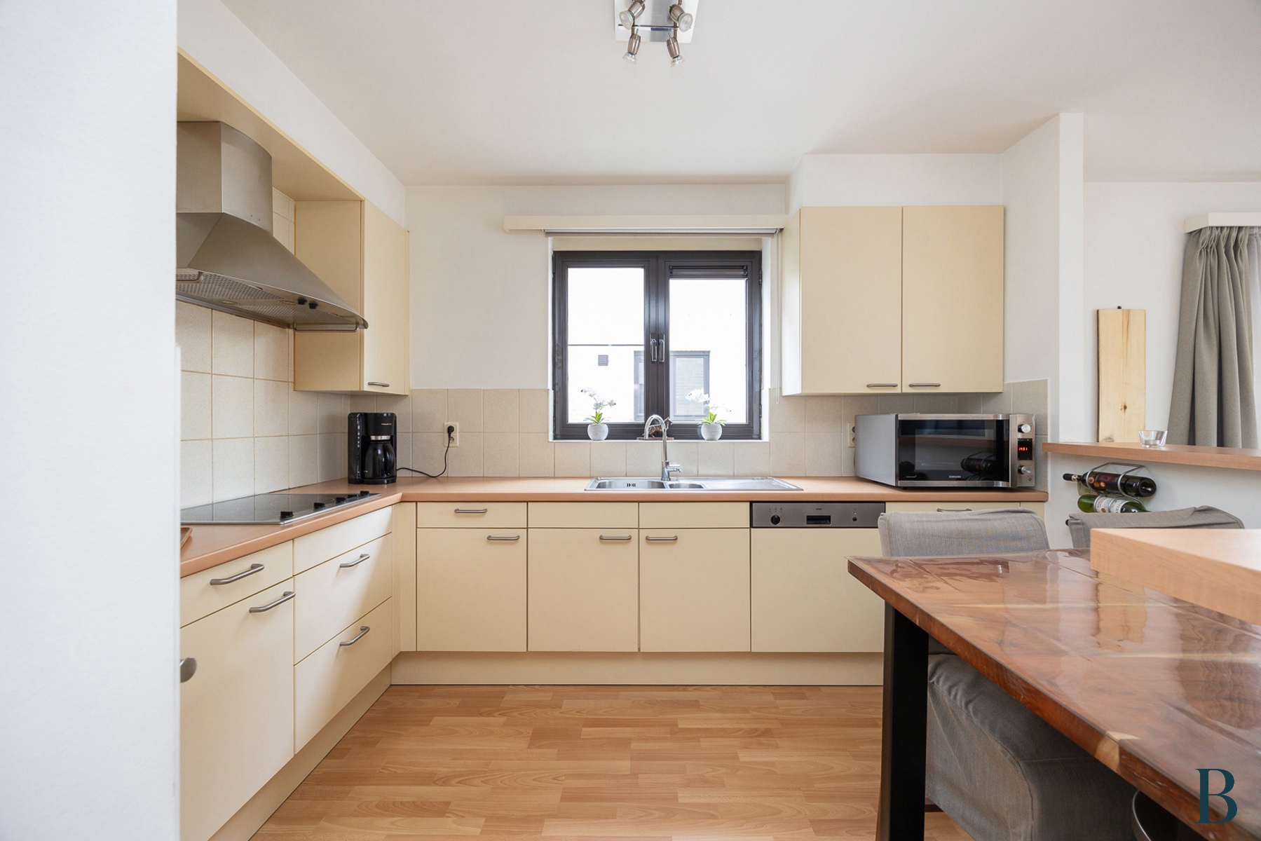 Lichtrijk hoekappartement met terras en garage - foto 5