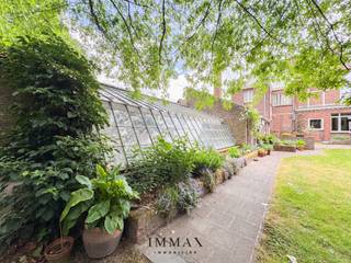 Karaktervolle Normandische cottagewoning met praktijkruimte, tuin, schuur en authentieke bunkerOp een royaal perceel aan de rand van Brugge bevindt...
