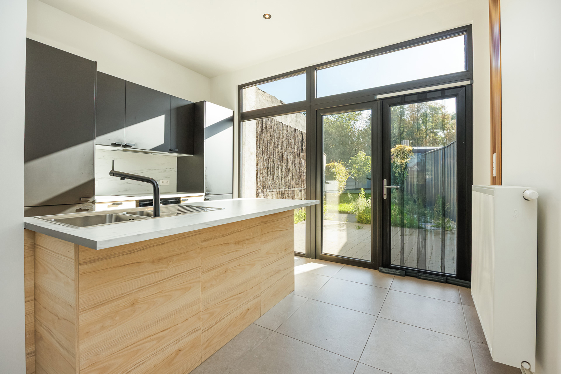 Volledig gerenoveerde en energiezuinige woning met tuin in Arendonk - foto 4