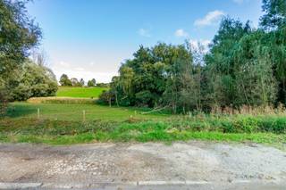 Ideally located in a verdant environment, we offer you this superb 15 ares 77 building plot, ready for the villa of your dreams! Free of...