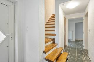 The home itself exudes space and possibilities. On the ground floor, you will not only find a spacious entrance hall with an indoor garage, but also...