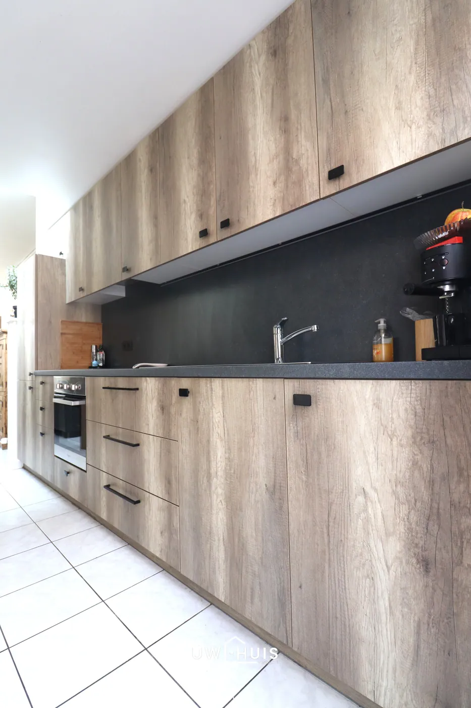 Woning met twee slaapkamers, terras én buitenberging te Temse - foto 4