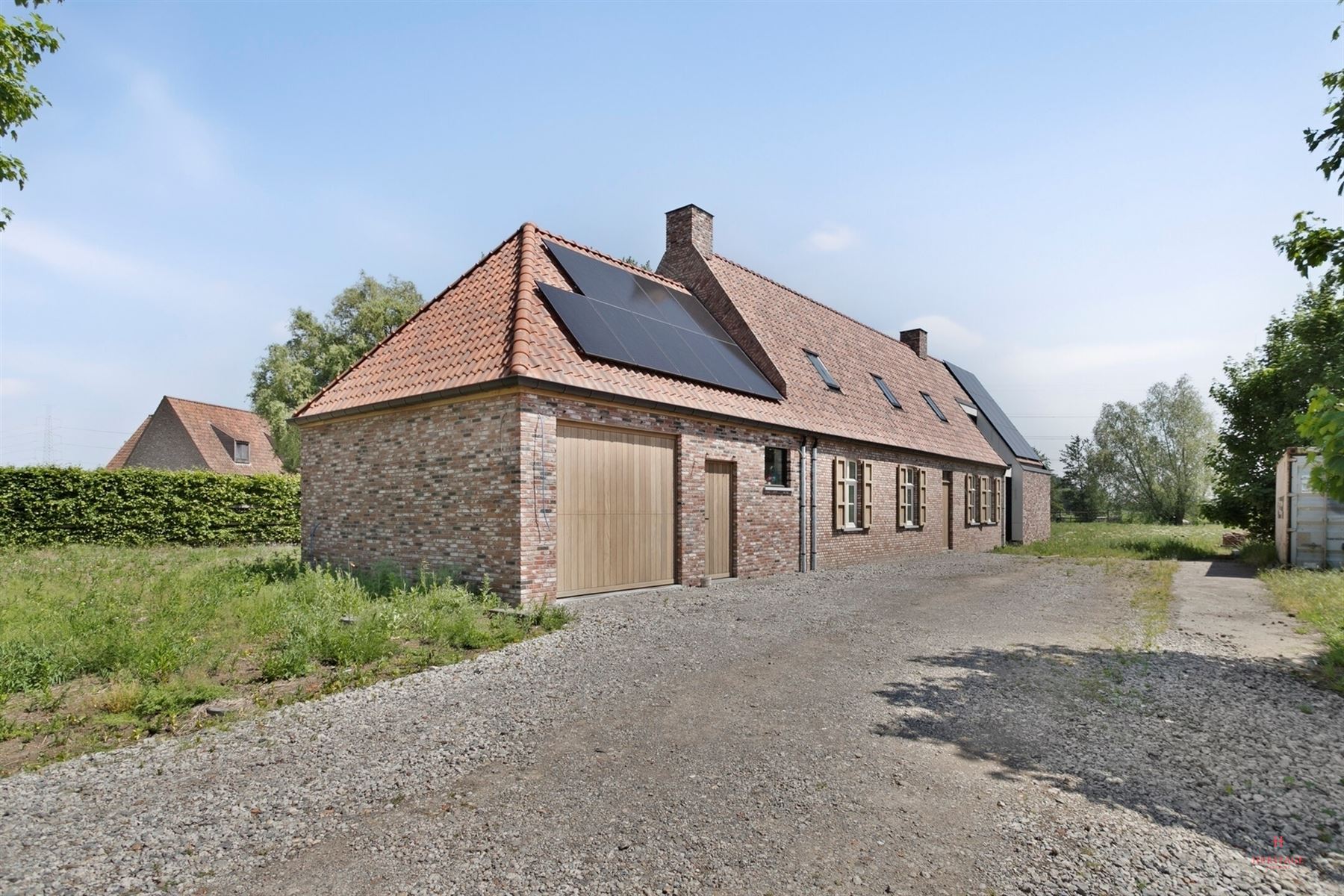 Ontdek deze unieke hedendaagse hoeve met tal van mogelijkheden op een perceel van 4.759 m² in Zulte - foto 2
