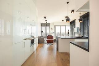 Welcome to the 13th floor of De Lichttoren at 81 Ellermanstraat - where space, light and views come together in a unique living experience. With...