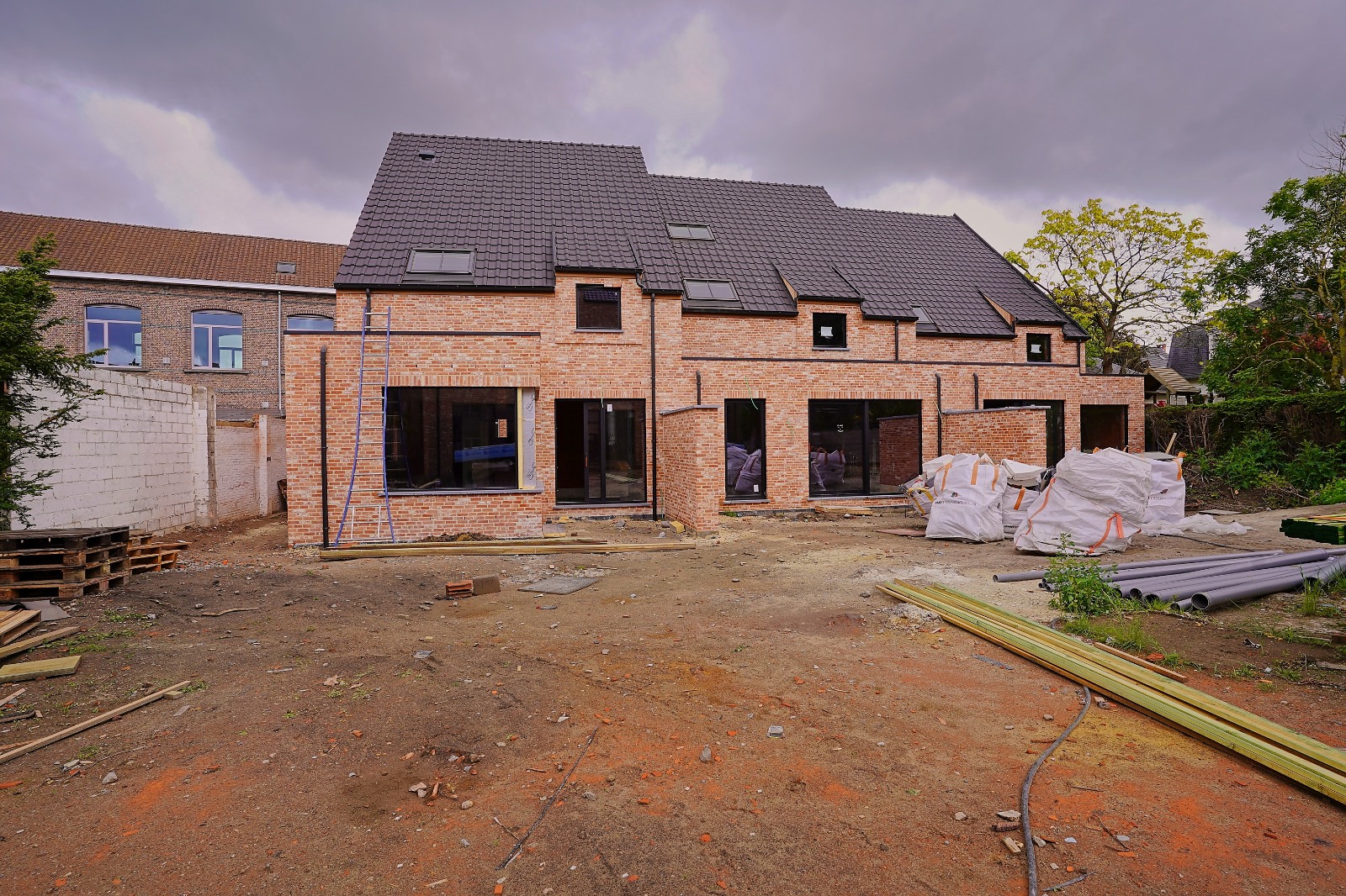 Nieuwbouwwoningen met zuidoriëntatie in het centrum van Bornem !!! - photo 4