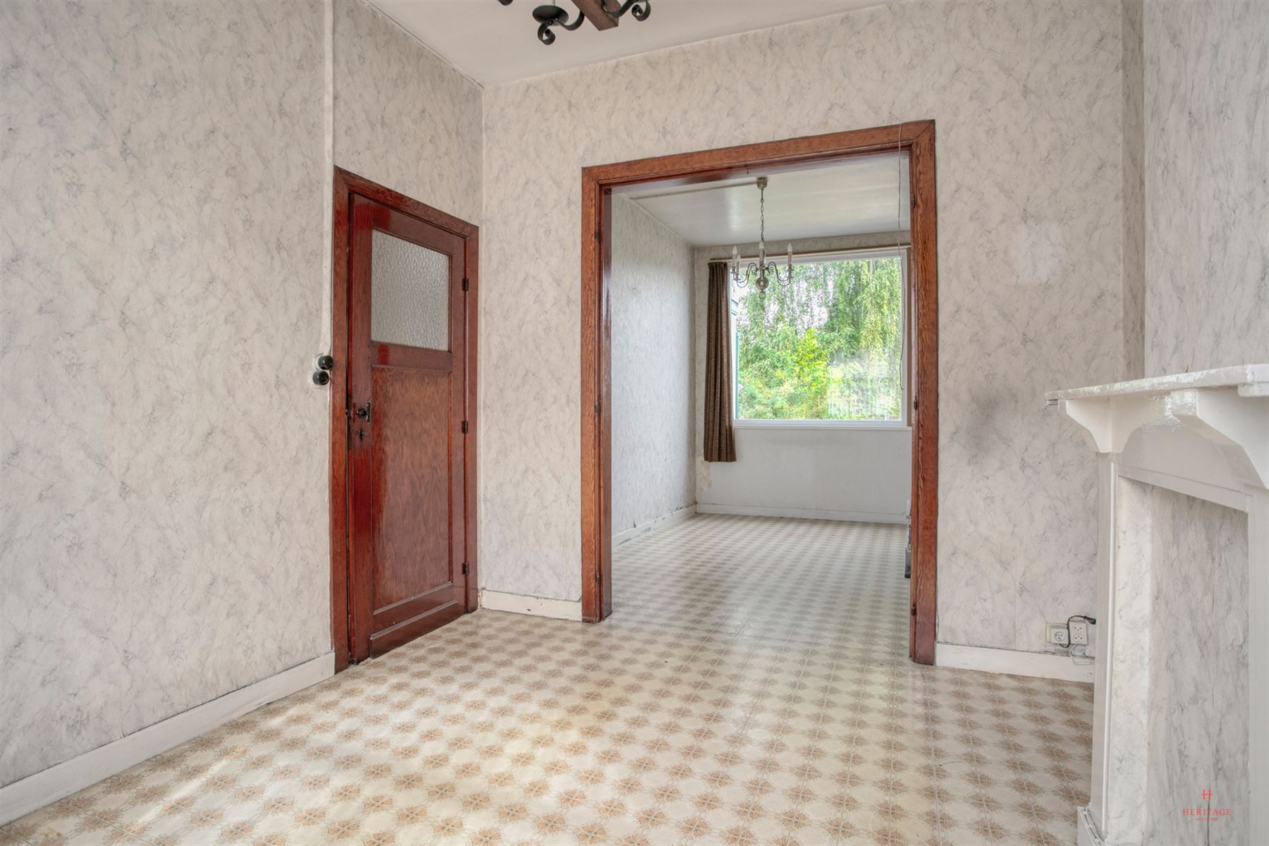 Gunstig gelegen te renoveren rijwoning met tuin - foto 4