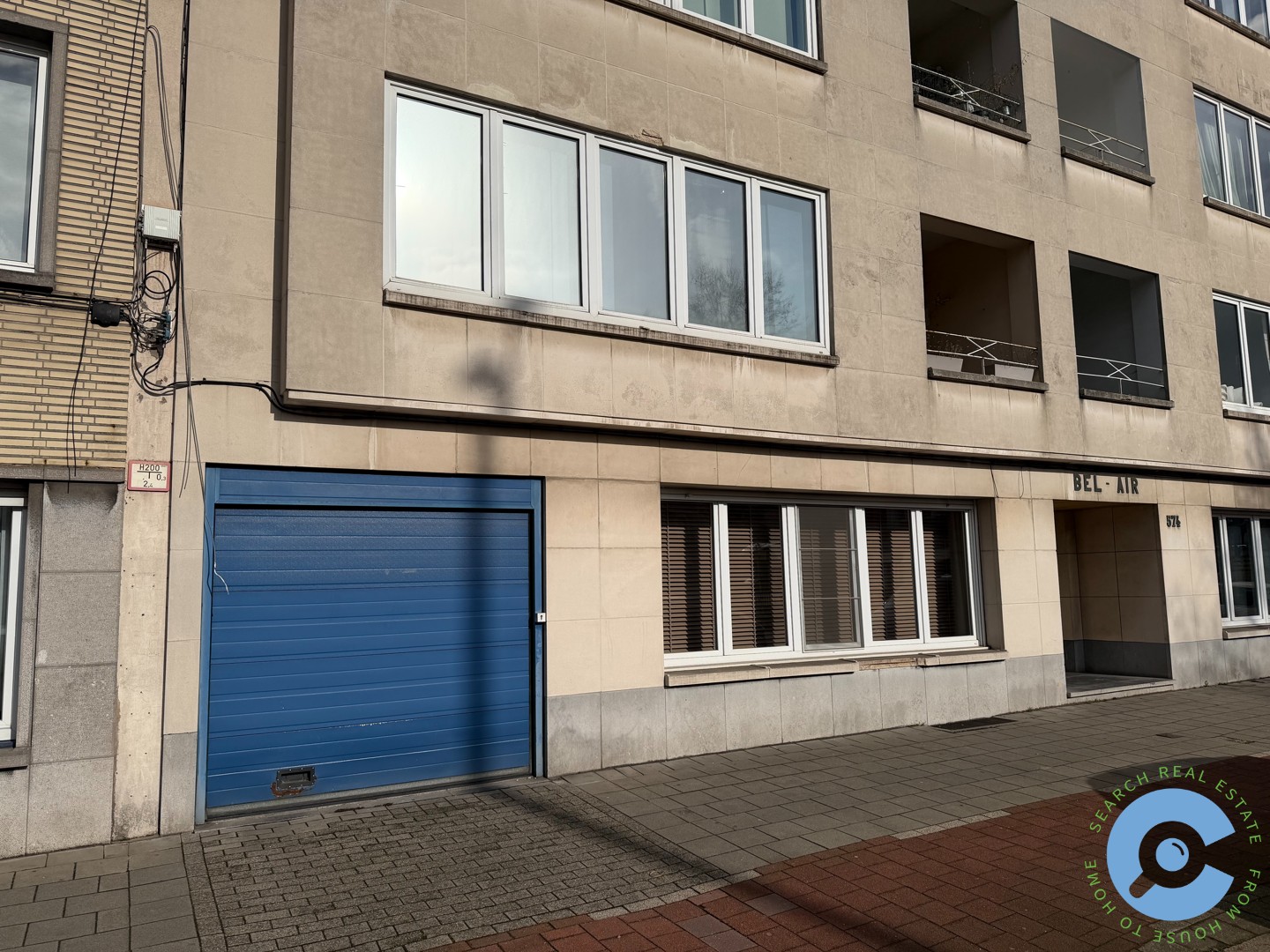 Overdekte autostaanplaats in afgesloten garage! - foto 2