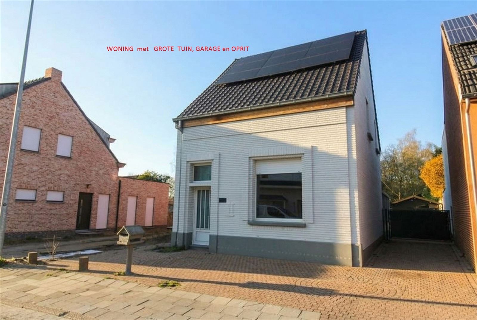 Ruim ingedeelde woning met grote tuin nabij centrum - foto 2