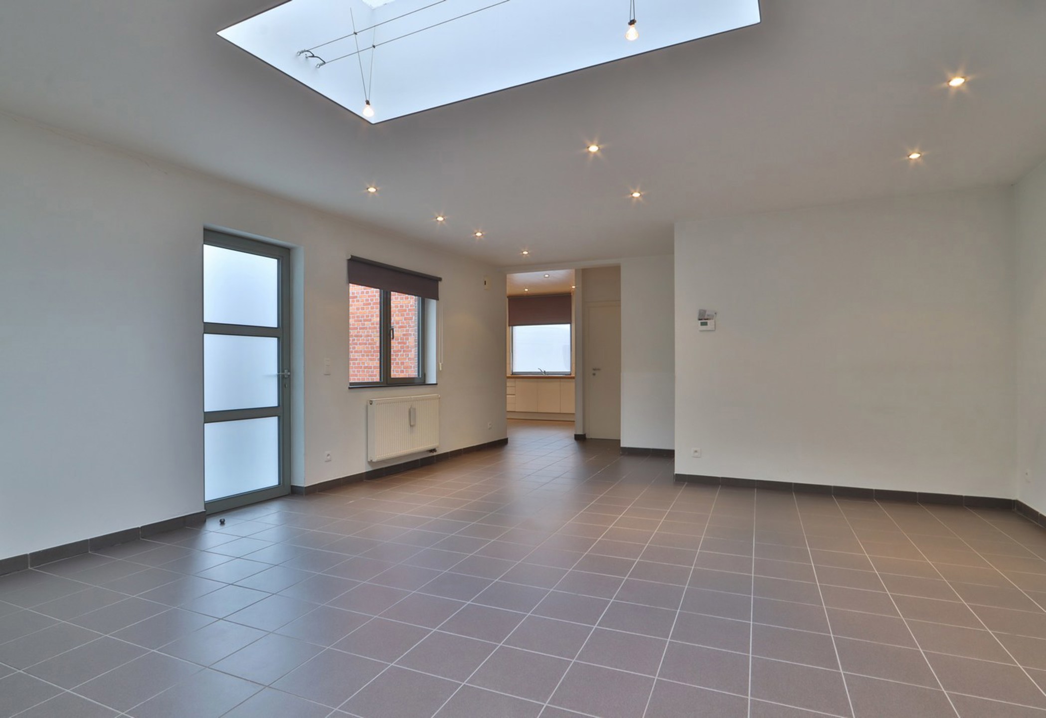 Woning met 2 slpks en terras in Melsele te huur! - foto 4