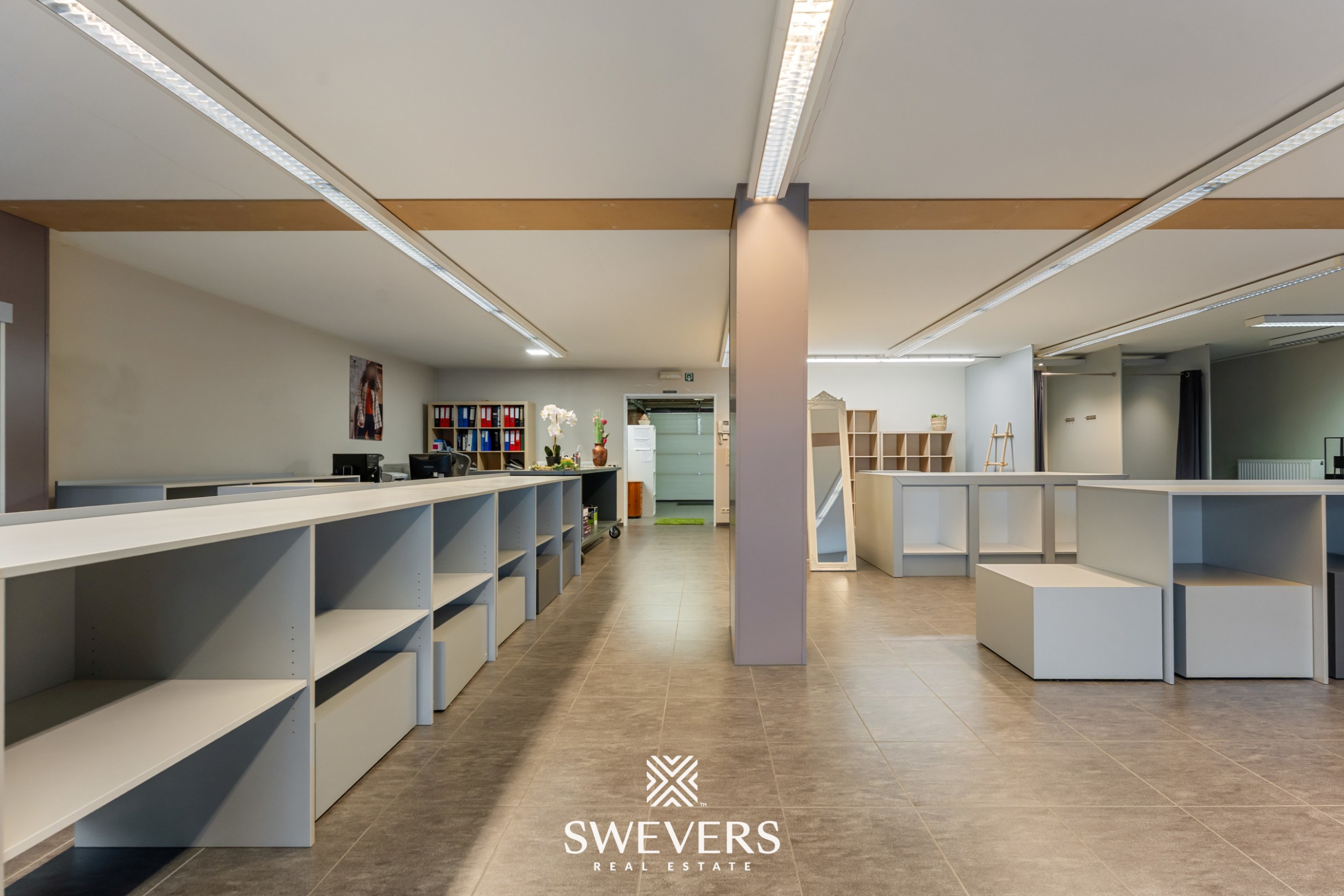 Opbrengsteigendom met handelspand, ruim appartement en uitbreidingspotentieel in hartje Heusden-Zolder - foto 5