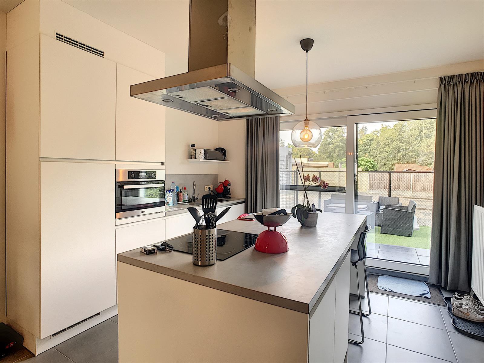 Recent gelijkvloers appartement met fijn tuintje. - foto 4