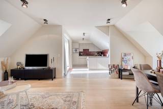 Cet appartement magnifiquement fini à vendre à Bruges allie confort moderne et excellent emplacement à proximité du parc verdoyant de Visart...