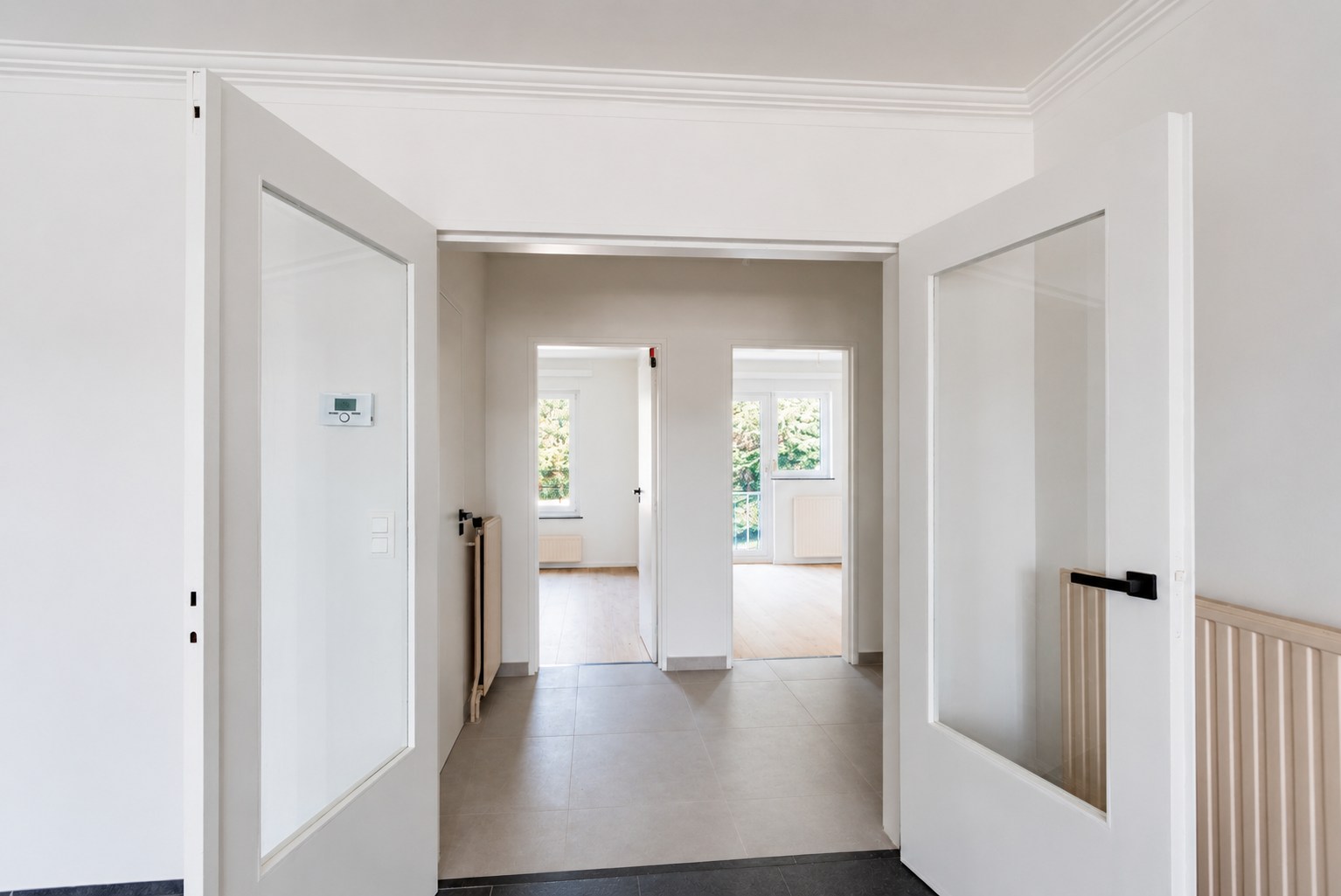 Vernieuwd appartement met 2 slaapkamers - foto 5
