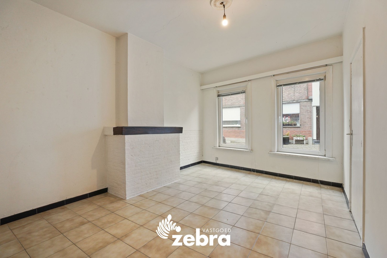 Deels gerenoveerde woning met twee slaapkamers te centrum Tielt! - foto 5