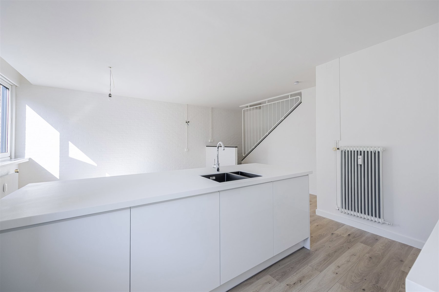 Gerenoveerd duplexappartement met 2 slaapkamers - foto 4