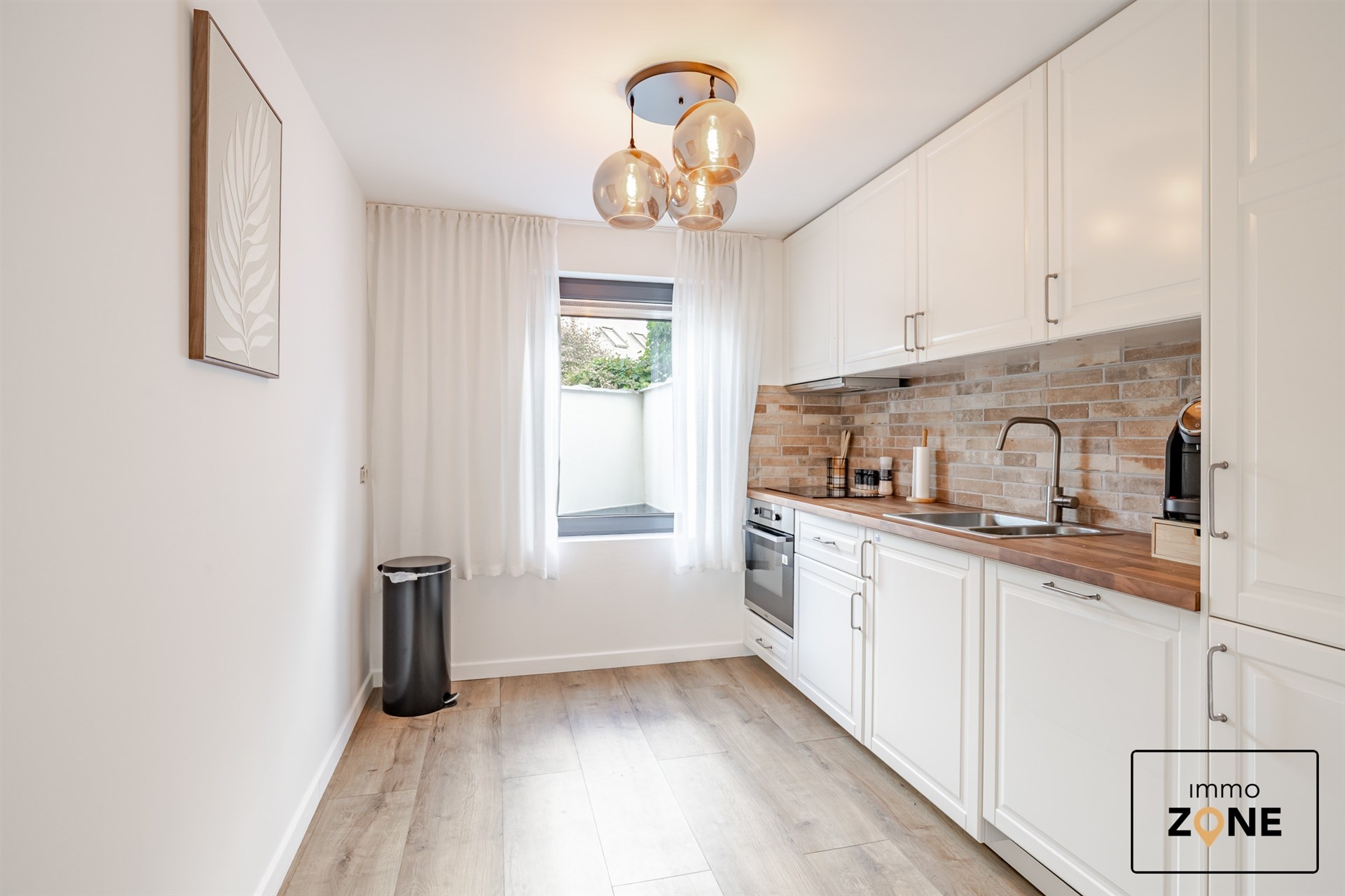 Karaktervolle handelswoning met ruim appartement in Hamme! - foto 3