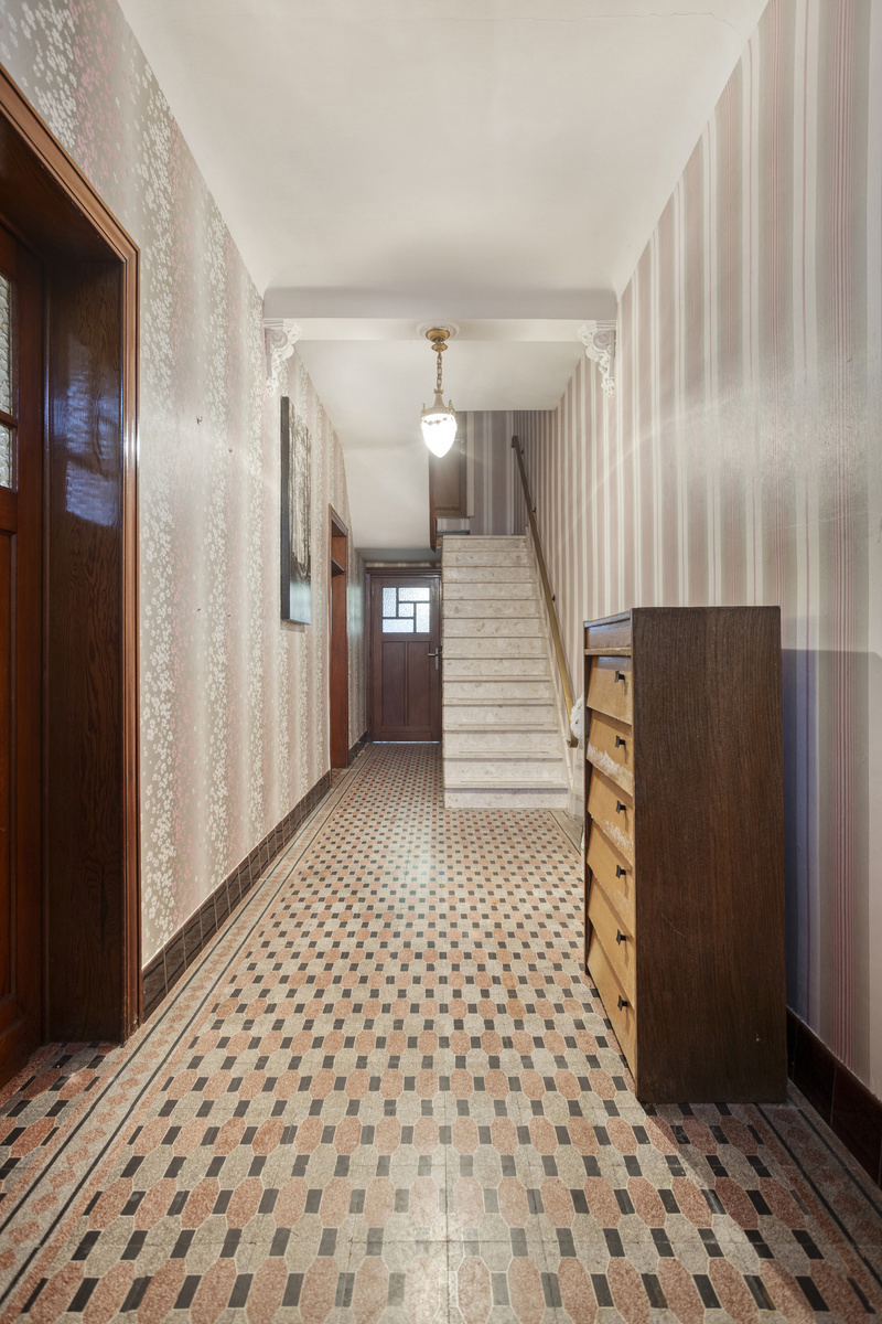 Te renoveren woning met naastliggende bouwgrond - foto 2