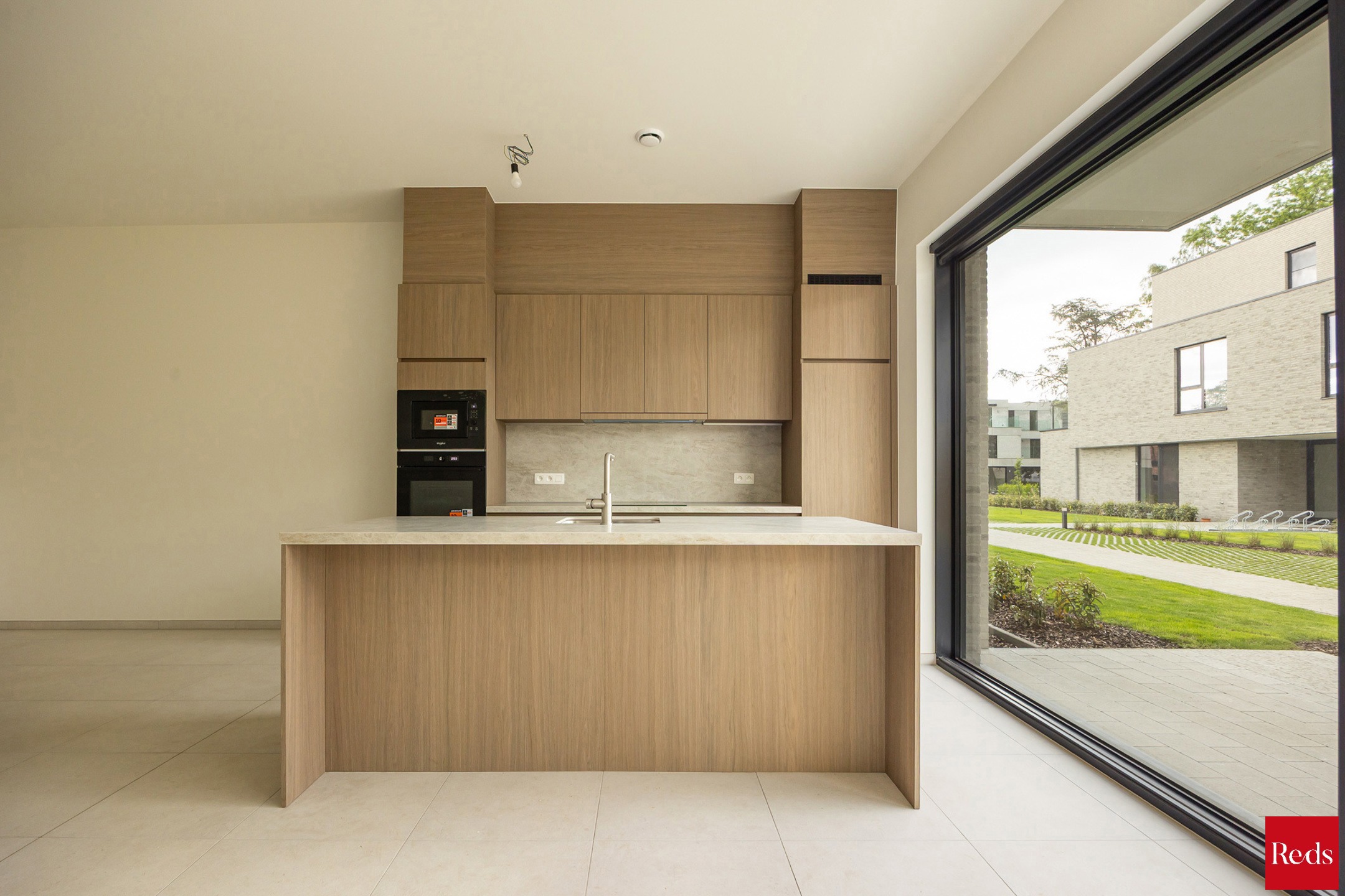Ruim gelijkvloers nieuwbouwappartement met 3 slaapkamers - foto 4