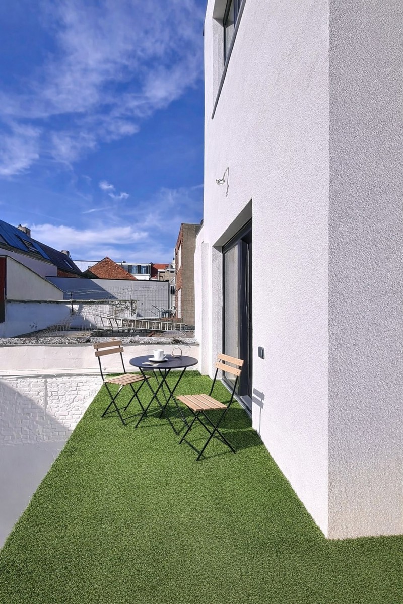 Vernieuwd 1 slaapkamerappartement met zonnig terras - foto 5