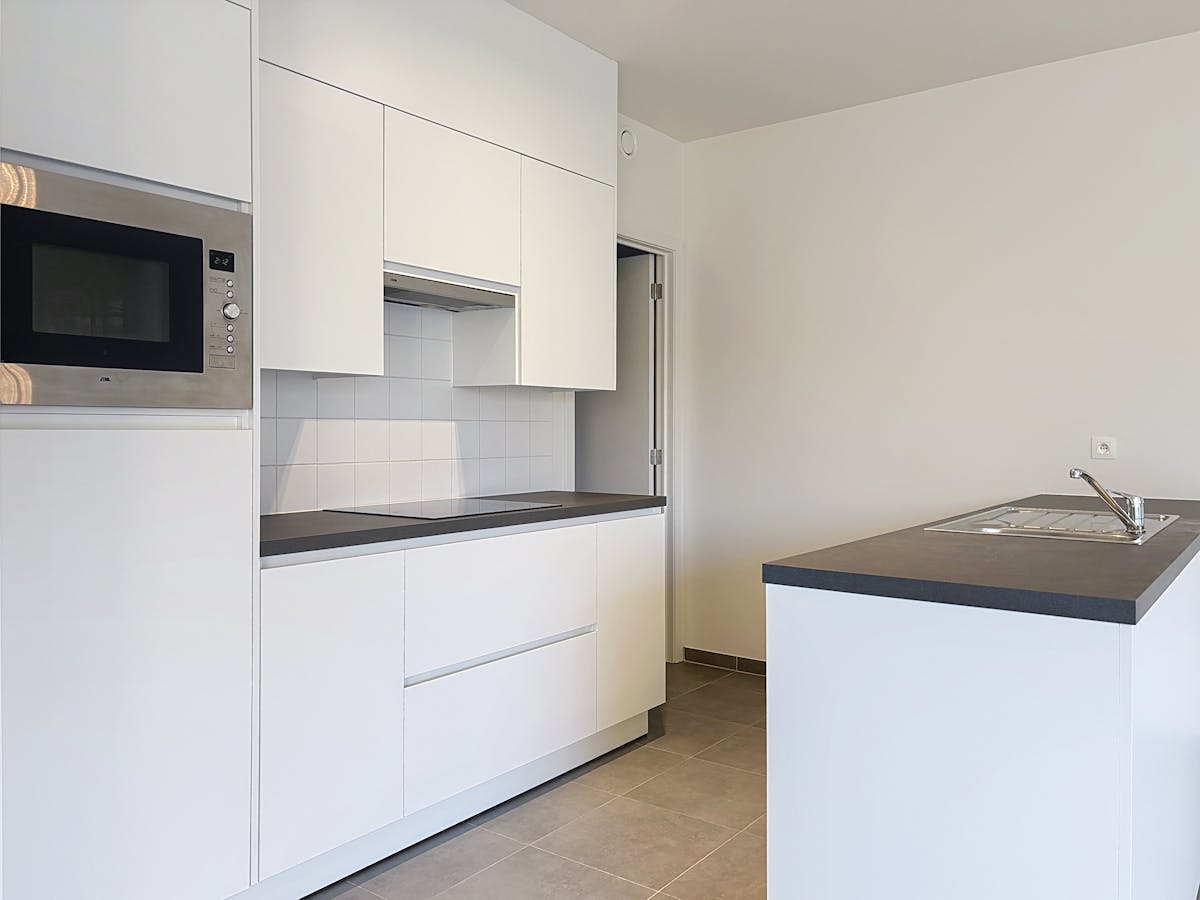 Gelijkvloers appartement met 2 slaapkamers en tuin te Westrozebeke - foto 5