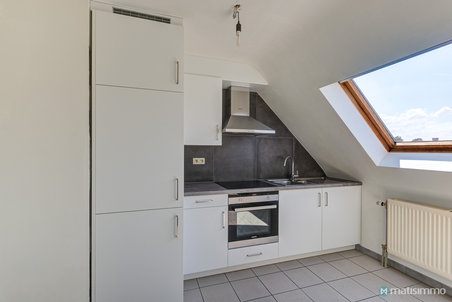 INSTAPKLAAR DUPLEX-APPARTEMENT MET 2 SLAAPKAMERS EN GARAGE NABIJ HET CENTRUM VAN BILZEN - foto 5