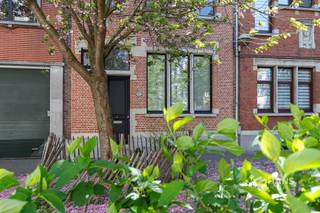 <p><span>De Neufstraat 6 - Deurne</span></p><p><span> </span></p><p><span>Characterful house (… m²) with 3 bedrooms and south facing city garden (40 m²) in Deurne.</span></p><p><span>This spacious house with authentic charm is located a stone's throw from the Rivierenhof. Thanks to the proximity of bus, streetcar and velo stations and easy access to the freeway, you enjoy excellent accessibility here. An ideal combination of tranquility, greenery and mobility.</span></p><p><span>The characterful facade immediately sets the tone. In 2011, the first floor, including the kitchen, was completely renovated and the front facade also received a refresh. In addition, the main and flat roofs as well as the rear facade were insulated, and the ground floor windows were renewed. The boiler dates from 2010. The hall, one bedroom and the bathroom still offer the possibility to modernize to your own taste — perfect to give it your personal touch.</span></p><p><span>You enter into the spacious entrance and staircase hall with separate guest toilet. To the rear is the fully equipped kitchen, which flows seamlessly into the living room, together accounting for an impressive 54 m². The skylight above the dining area provides pleasant light. Adjacent is a practical storage/laundry room (5 m²).</span></p><p><span>The south-oriented city garden of approximately 40 m² is a real asset — a cozy place to enjoy the sun.</span></p><p><span>On the second floor there are two spacious bedrooms of 16 m² and 22 m², one of which can still be finished. The upper floor houses the bathroom (11 m²) and the third bedroom (18 m²), with the possibility of converting the adjacent storage room (4 m²) into a dressing room.</span></p><p><span>Finally, the house has a dry cellar.</span></p><p><span>Are you looking for a character home with space and potential in a prime location near greenery? Do not miss this opportunity! Living area … m² ref: gross floor area. For more info or a free appraisal visit </span><span><span>www.hansimmo.be</span></span></p><p><span> </span></p>