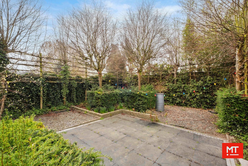 Veelzijdig gebouw bestaande uit handelsruimte, woning en appartement in het centrum van Wervik - foto 5