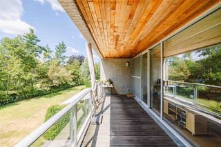 DE PINTE - Ruim appartement met zonnig terras en groen uitzicht in hartje De Pinte Gelegen op de eerste verdieping van de groene residentie Park te...