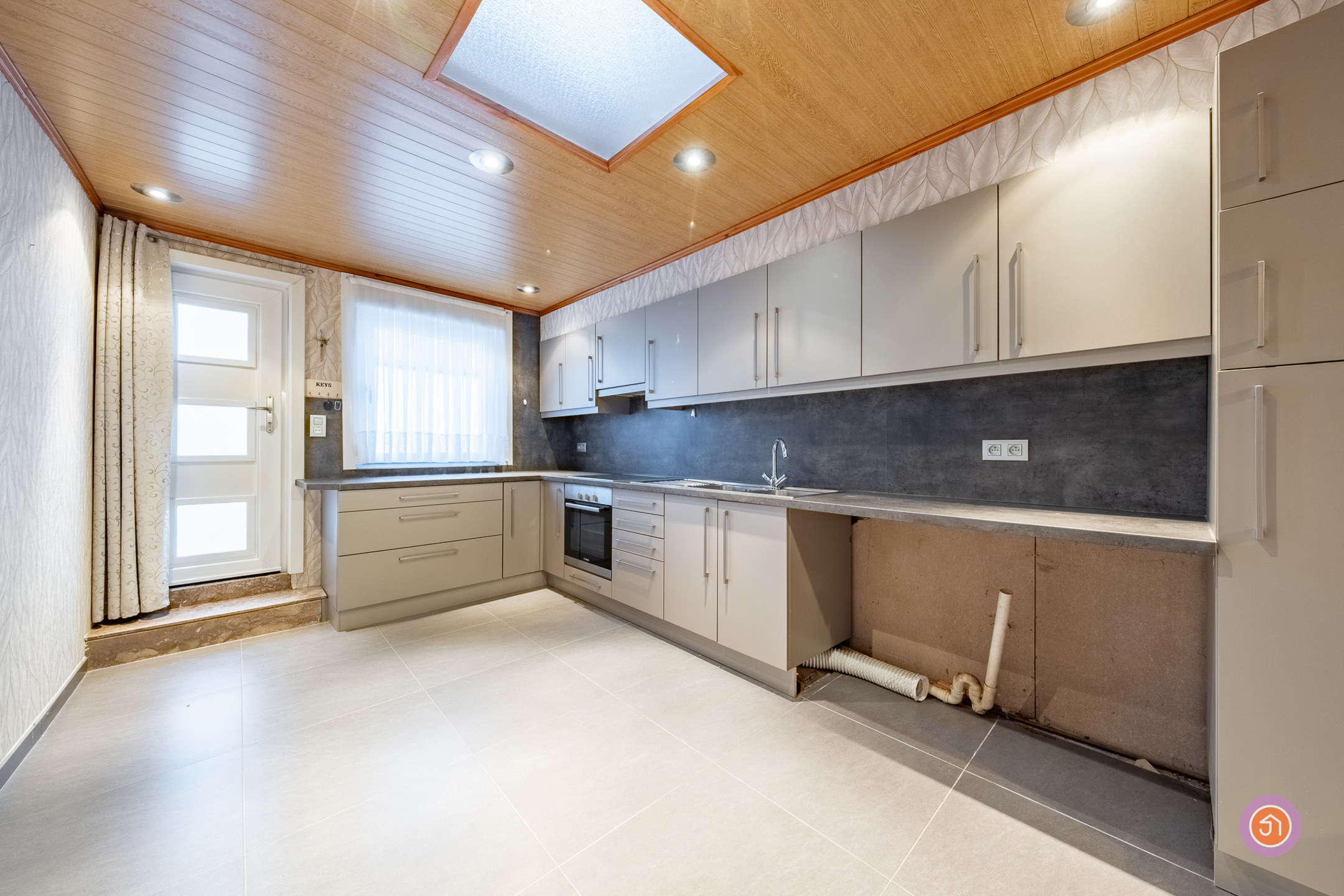 Goed onderhouden starterswoning met garage en tuin - foto 5