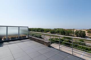 This penthouse apartment for sale is located on the fifth floor of Residentie Seaside (2006) along the Driftweg in Bredene. <br />Enjoy ultimate exclusivity with an elevator that opens directly into your penthouse. Thanks to the two magnificent terraces (45m² and 60m²), you can enjoy the sun all day long. At the front, you will also be treated to a beautiful dune and sea view. <br /><br />Layout:<br />- bright living space with gas fireplace<br />- open kitchen equipped with every comfort<br />- terrace 1 (60m²) with fantastic dune view <br />- terrace 2 (45m²) with an awning and access to the patio shed<br />- storage room with connection for washing machine<br />- night hall<br />- separate toilet with hand wash basin<br />- master bedroom with ensuite bathroom (shower, sink and toilet) <br />- bathroom 2 (bathroom furniture and shower)<br />- bedroom 2<br />- bedroom 3<br /><br />Possibility to purchase a deep garage (10m70), which is easily accessible from the street side.<br /><br />Pros:<br />- EPC label B<br />- compliant electrical inspection<br />- air conditioning<br />- 3 full bedrooms - 2 bathrooms<br />- numerous built-in closets (living room and bedrooms)<br />- beautiful terraces<br />- possibility to purchase a garage in the building<br />- recent building<br /><br />This unique penthouse combines the peace and grandeur of the dunes with the ultimate comfort of a modern, voluminous apartment. An absolute godsend on the coast! Contact us today for an on-site visit and be enchanted by the breathtaking view.<br /><br />Register of measures: no