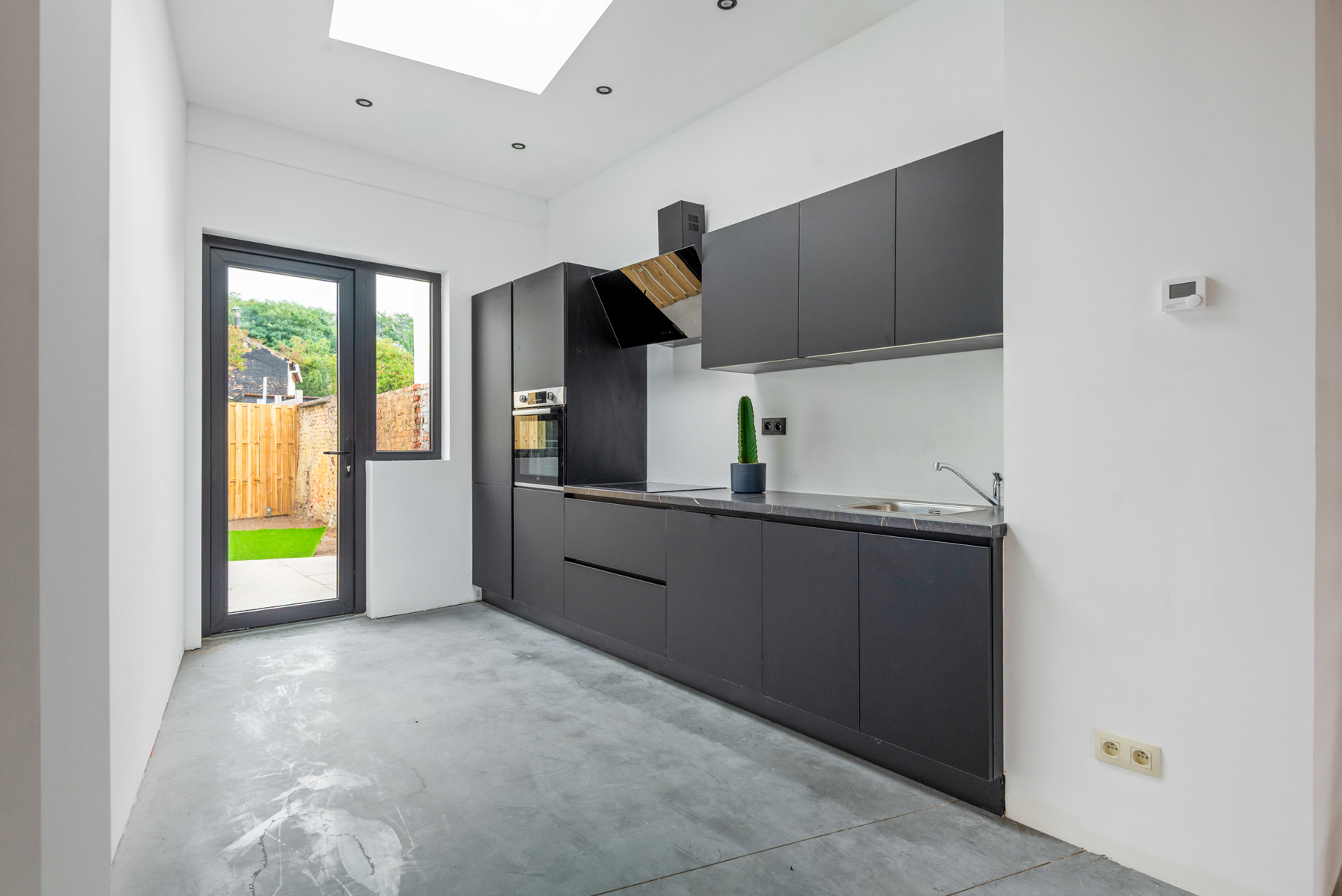 Volledig vernieuwde woning met stadstuin en 2 slpk - foto 4