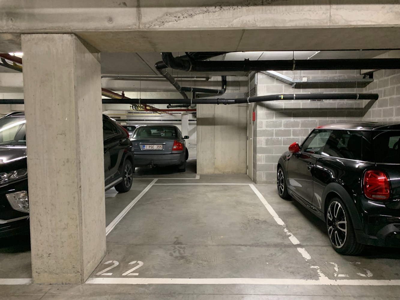 Overdekte en afgesloten autostaanplaats P22 gelegen onder residentie Edelweiss te Korbeek-Lo! - foto 2