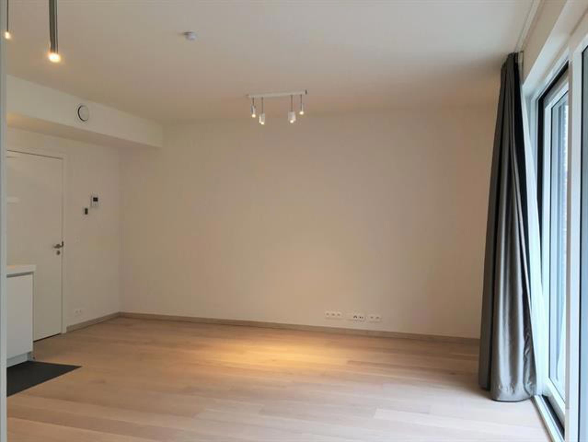 Mooi appartement met 1 slaapkamer + parkeerplaats en kelder - foto 5