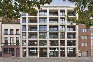 Nieuwbouwappartement op Het Eilandje van ca. 55m² met één slaapkamer en een terras.Indeling:De inkomhal verleend toegang tot alle ruimtes: de...