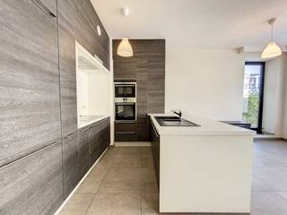 Two bedroom apartment located on the ground floor of a recent building (2016) in the residential area of Jette. The apartment has a large garden and two covered parking spaces. Requests via our website are given priority.Apartment composition:- spacious bright living room with open kitchen- kitchen with dishwasher, oven, stove, fridge with freezer, double sink- two bedrooms +/- 11m² and 15m²- the master bedroom has built-in wardrobes- bathroom with double sink, bath and shower- entrance hall with built-in cloakroom closet- guest toiletExtra benefits:- garden- double parking (n°24 and n°25) at 75 euro per parking space. 100 euro if rented individually.- connection for washing machine provided in the bathroomRental price: 1.380.00 EUR/month Charges: 120.00 EUR/month for common areas, heating and water.Still take electricity costs into account yourself. (individual gauges)Would you like to view this apartment? Please submit a request via our website. www.dewaele.com