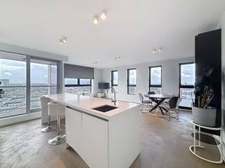 Wonen op hoog niveau op het Eilandje op de 19e verdieping met adembenemend zicht op de jachthaven. Welkom in dit stijlvol gemeubelde appartement...