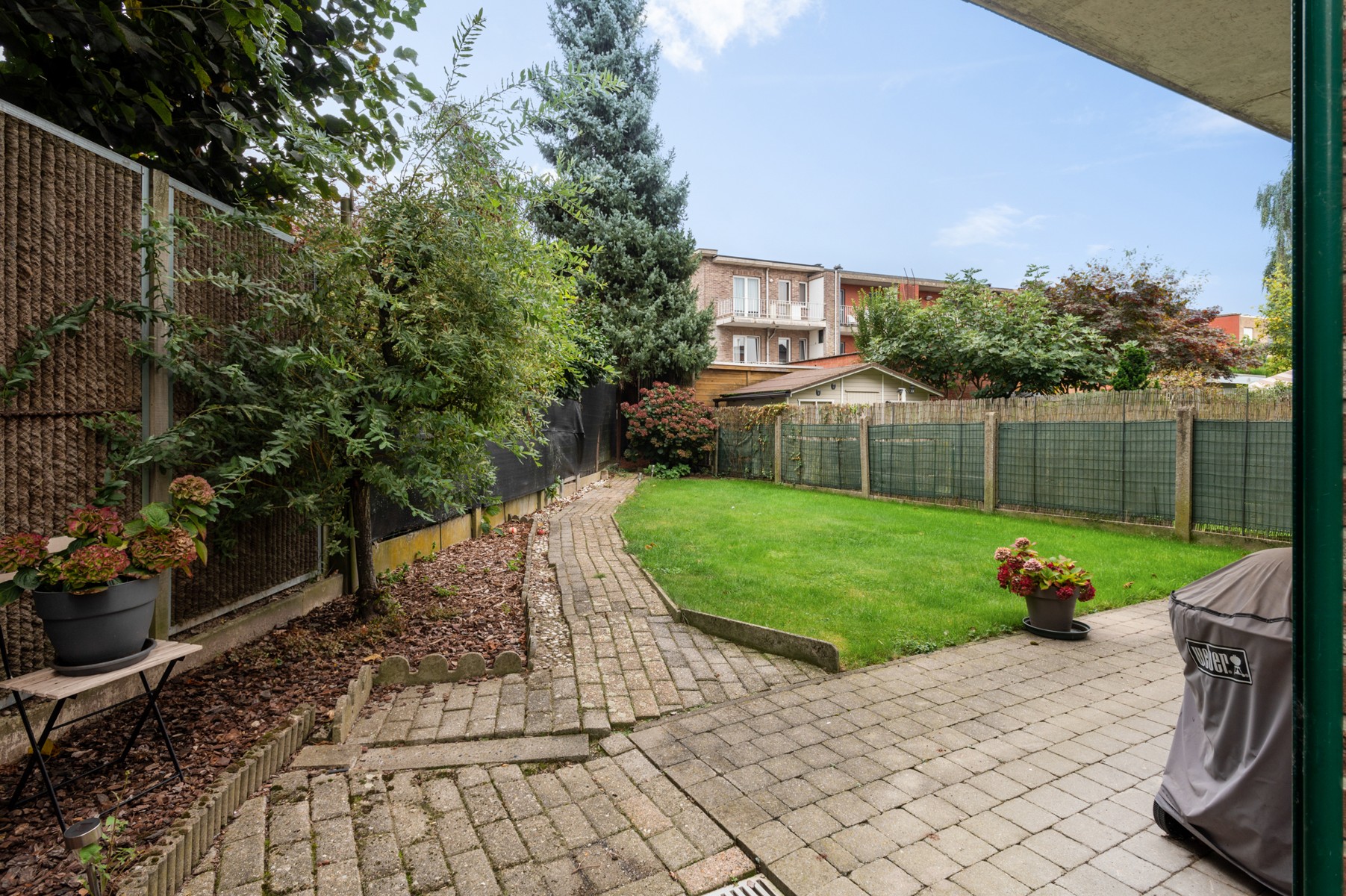 Gelijkvloersappartement met zonnige tuin, garage en staanplaats - foto 4