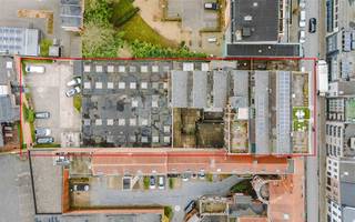 SINT-NIKLAAS - Offre d'acquisition de parts dans une société patrimoniale comprenant un entrepôt unique divisé en bureaux, entrepôt, lofts et...