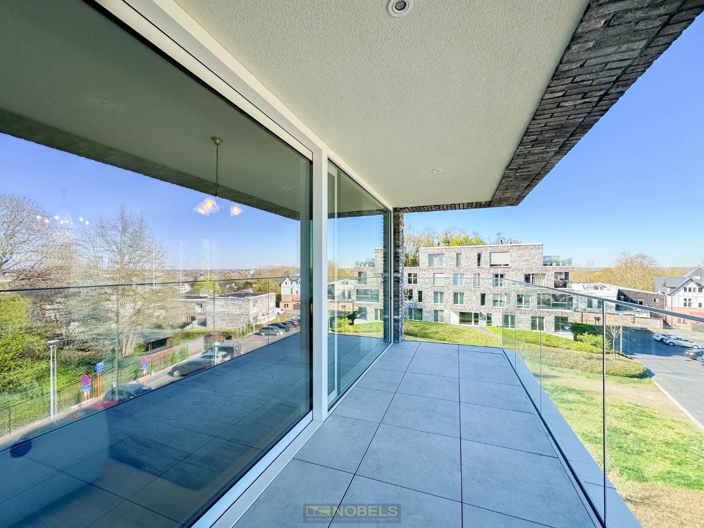 À vendre, appartement lumineux avec grande terrasse et emplacement de parking à Gavere. - photo 2