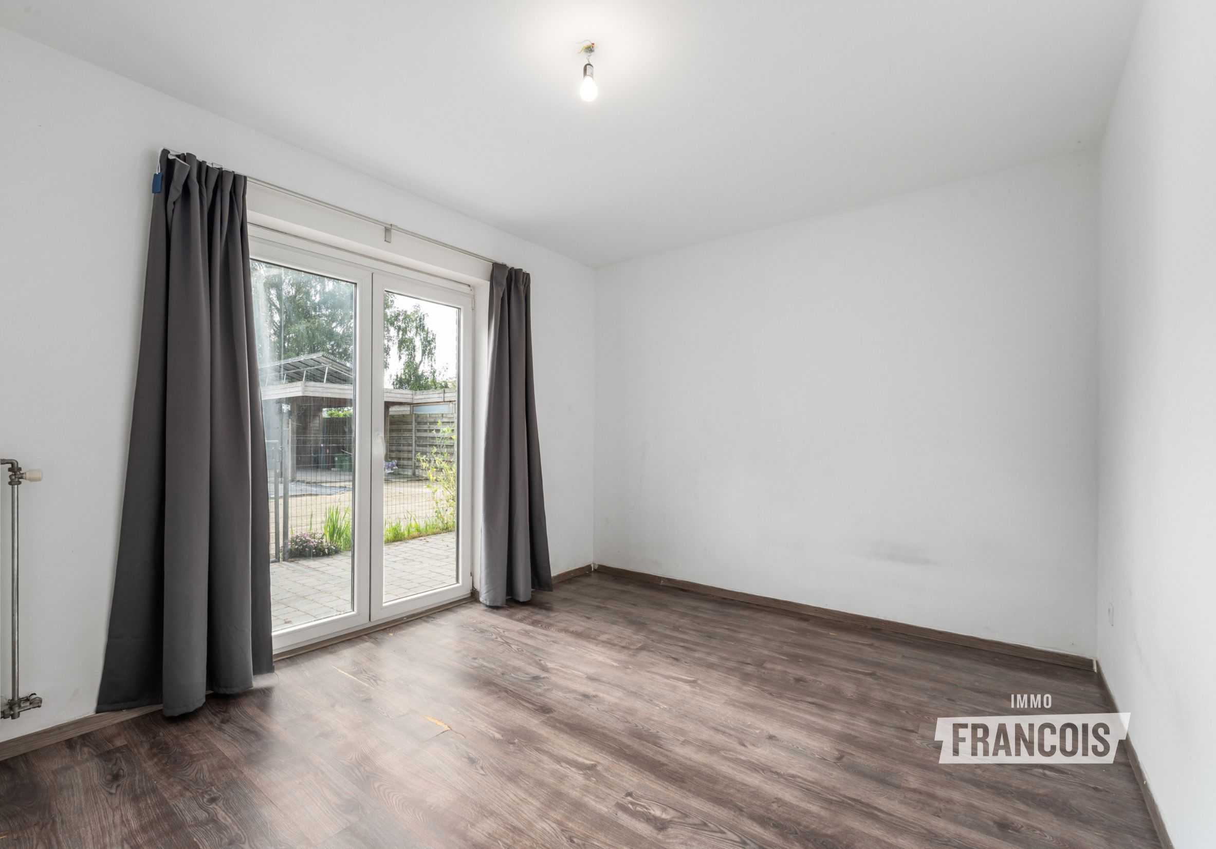Gelijkvloers appartement met ruime tuin in Zelzate - foto 5
