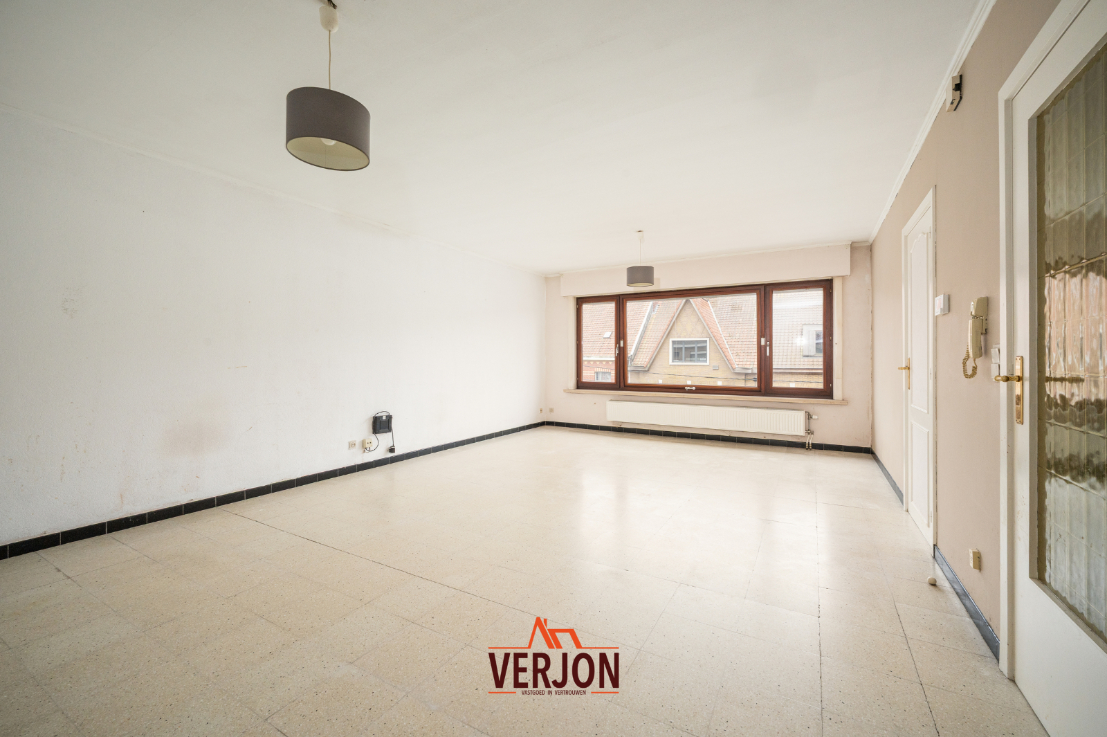 Centraal gelegen appartement met 3 slaapkamers! - foto 2