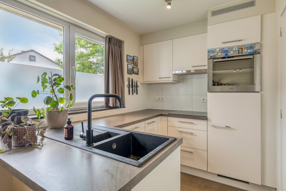 Lichtrijk appartement met 2 slaapkamers en ruime buitenruimte te Zwijnaarde - foto 5