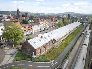 Prachtige goederenloods (voormalig NMBS gebouw) van 1304 m² met verschillende mogelijkheden tot ontwikkeling zoals kantoren, commercieel,...