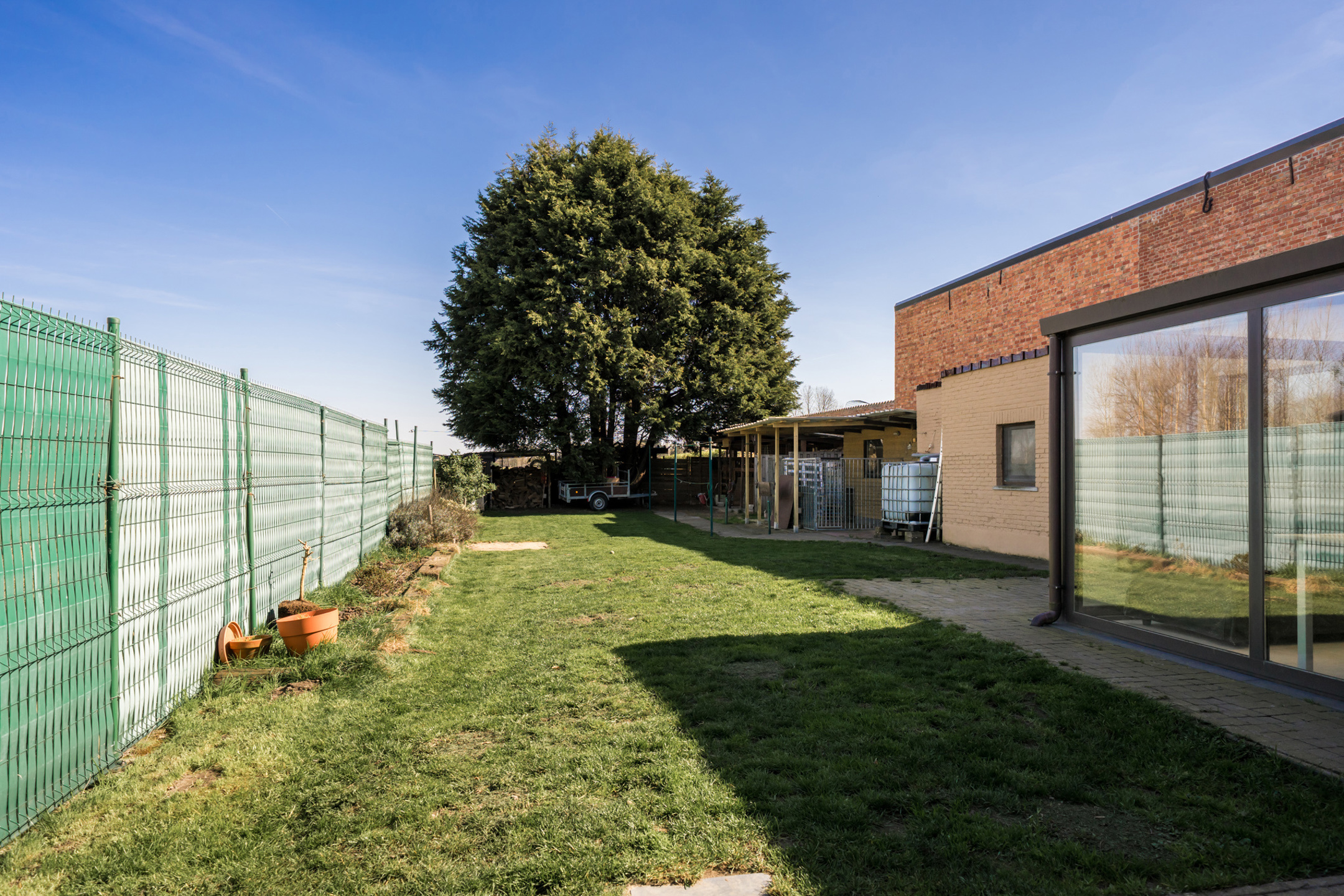 Halfopen bebouwing met mooie tuin en grote garage/atelier - foto 3