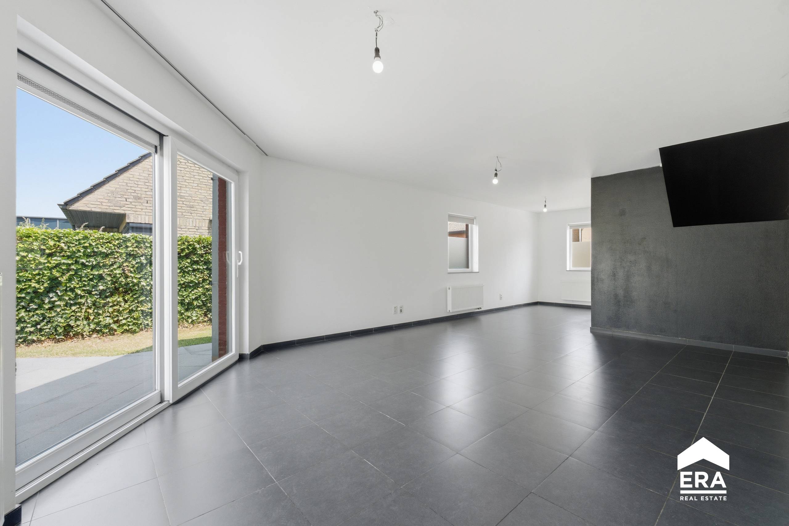 Halfopen instapklare woning met garage en tuin in Dadizele - foto 4